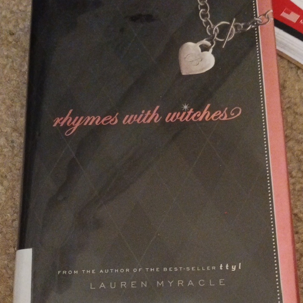 'Rhymes with Witches' Book - Black Cover